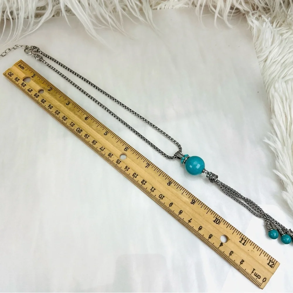 Pretty Silvertone and blue southwestern style fringe pendant costume necklace